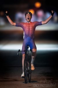 Cyclist crossing finish line at hyde park blast